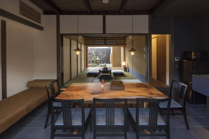 View of a Japanese washitsu room and garden in a traditional Japanese house