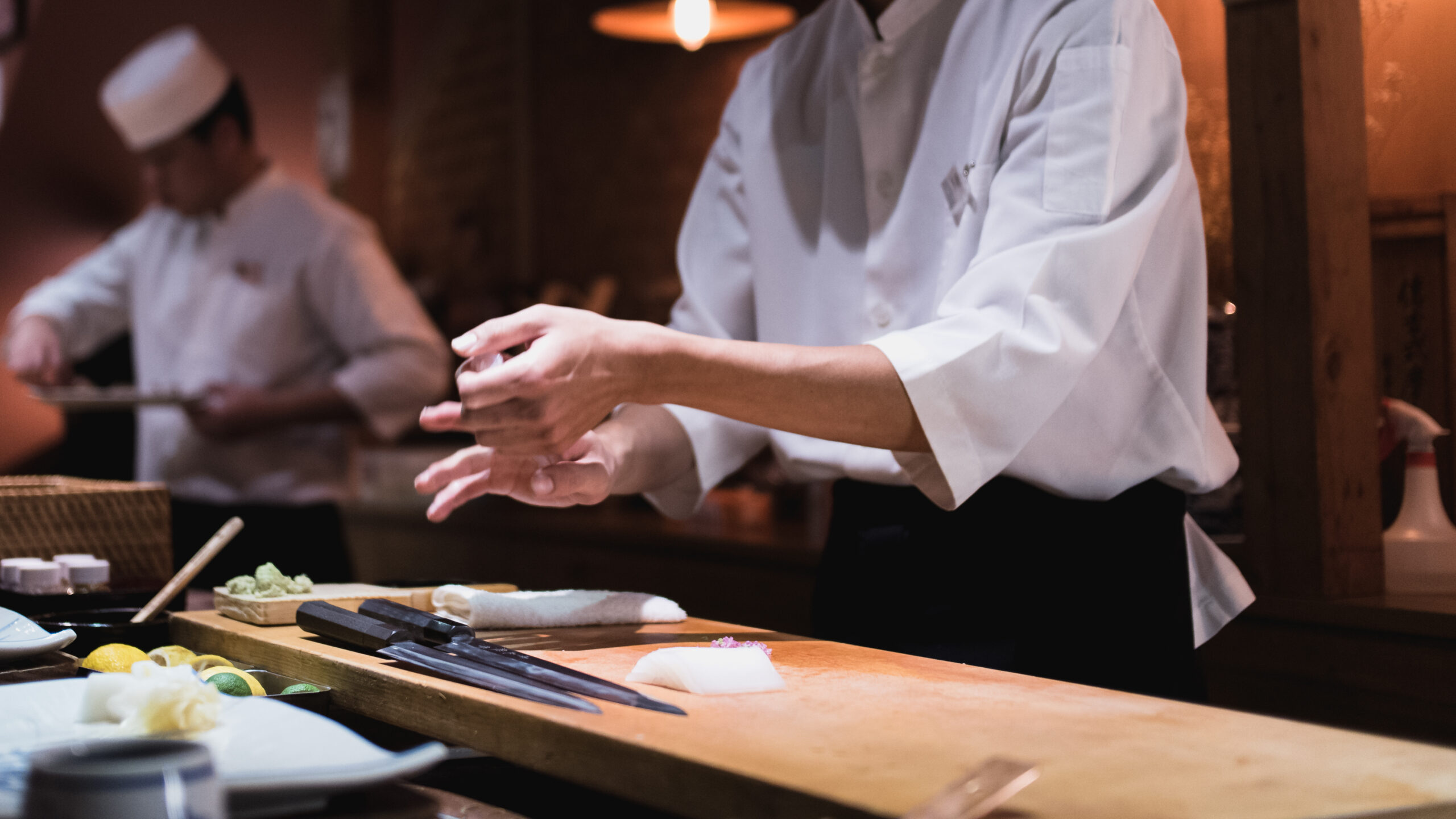 Chef preparing sushi, squeezing rice, fast motion in hands. Omakase style Japanese traditional. Chef preparing sushi, squeezing rice, fast motion in hands. Omakase style Japanese traditional.