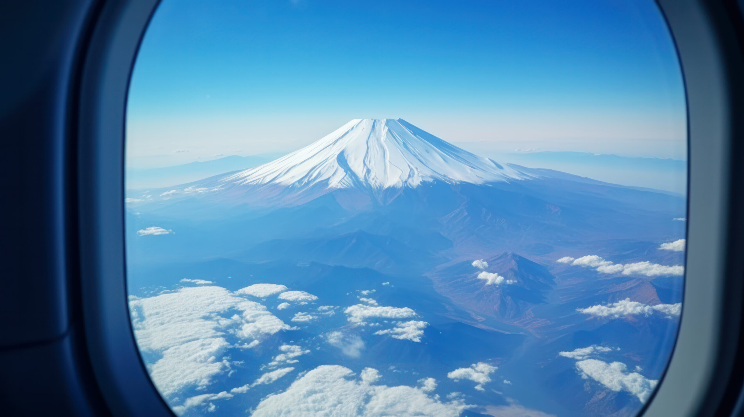 Fuji mountain view looking from airplane window