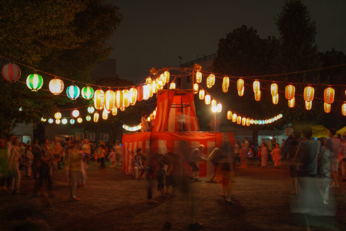 Bon Odori image of summer festival with festival goers wearing yukata